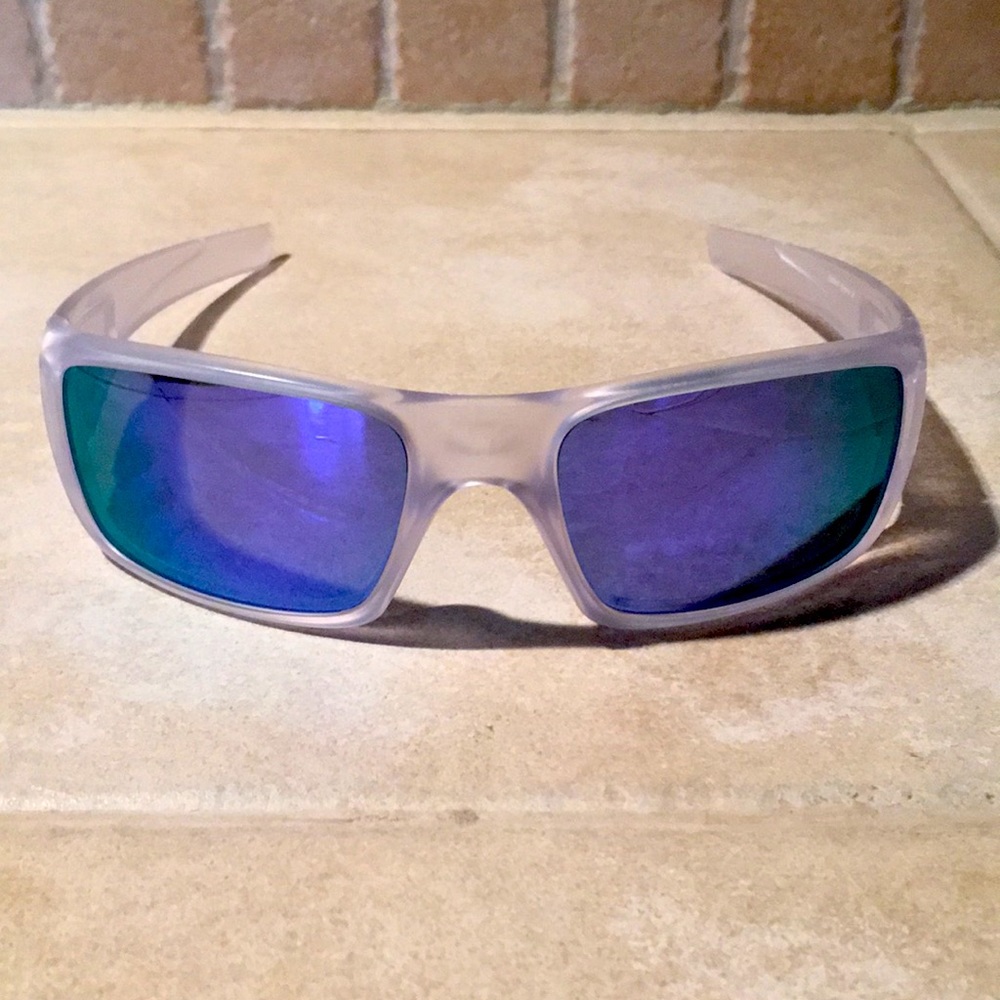 Oakley POLARIZED frosted clear/gray frames with purple iridescent lenses.